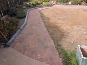 Finished block paving path connecting to the existing patio